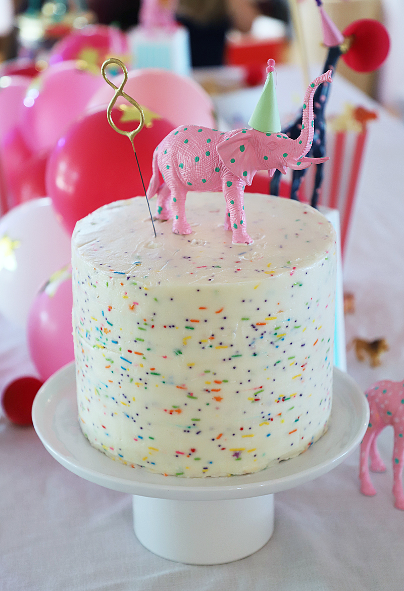 elephant cake topper on sprinkle cake